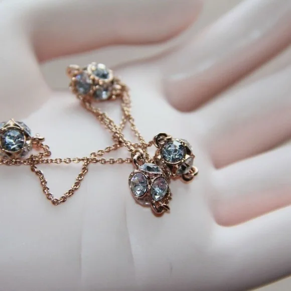 Kate Spade ♠️ Lady Marmalade Rose Gold/Clear Crystal Necklace.
NWT - Picture 10 of 12